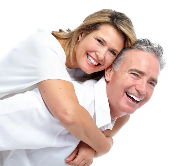 Happy married couple smiling together, symbolizing strong relationship and well-being